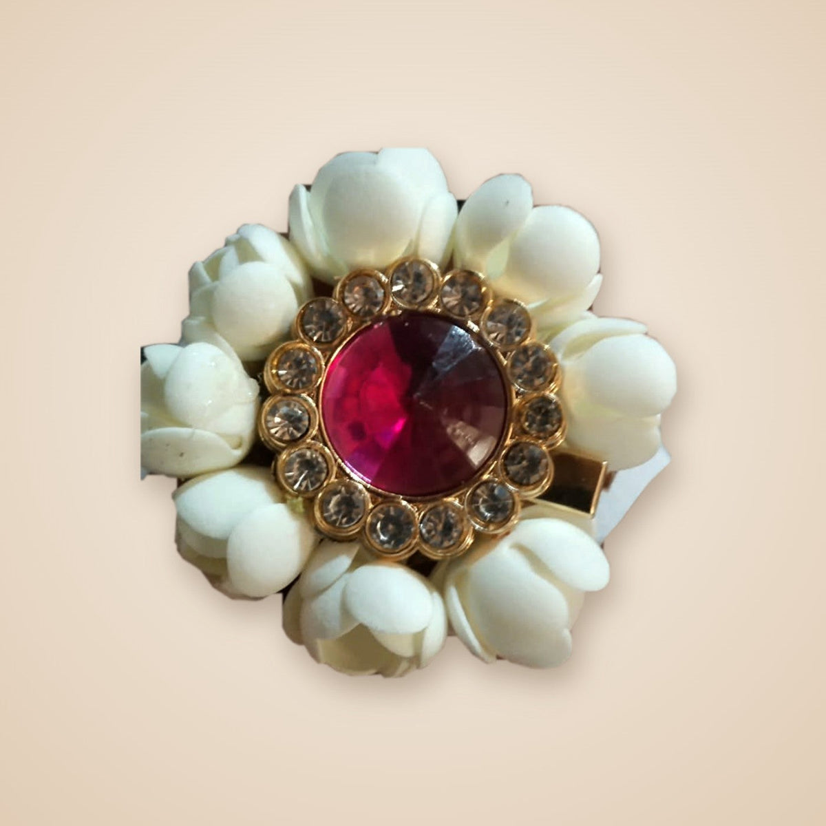 Handmade jasmine hair clip with a ruby-pink stone