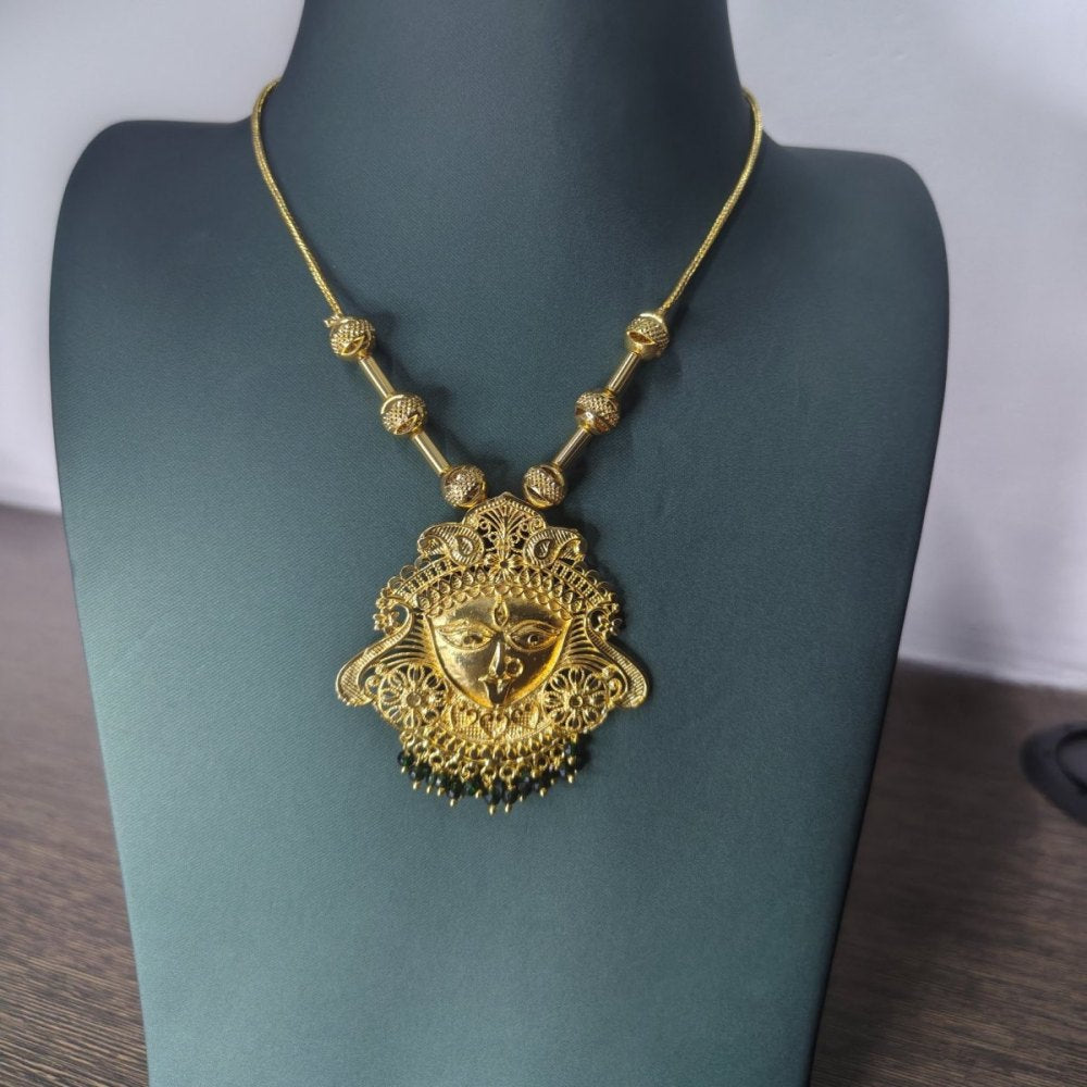 Durga face pendant chain on a necklace stand